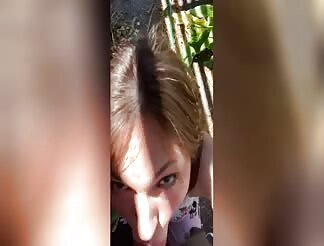 Blonde facialized after giving a playful outdoor blowjob