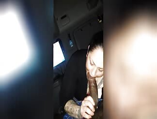 Inked chick slobbers on a big black cock