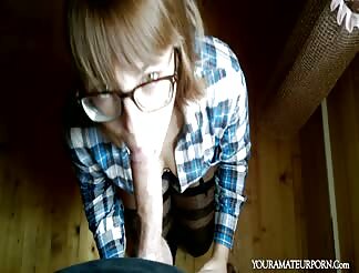 Decorating her pretty face with a big load of spunk