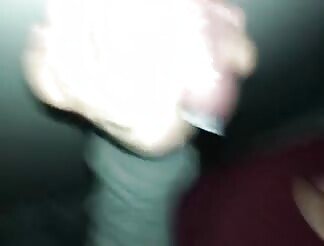 She is blowing two cocks in this glory hole 