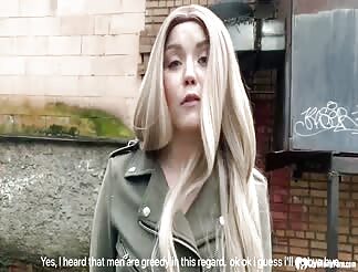 Cute blonde puts on a sexy outfit