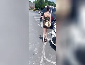 Popping ass in short skirt in public parking lot