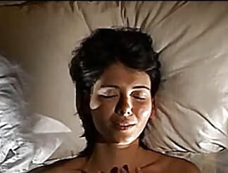 Point-of-view massive hooters on a bed 